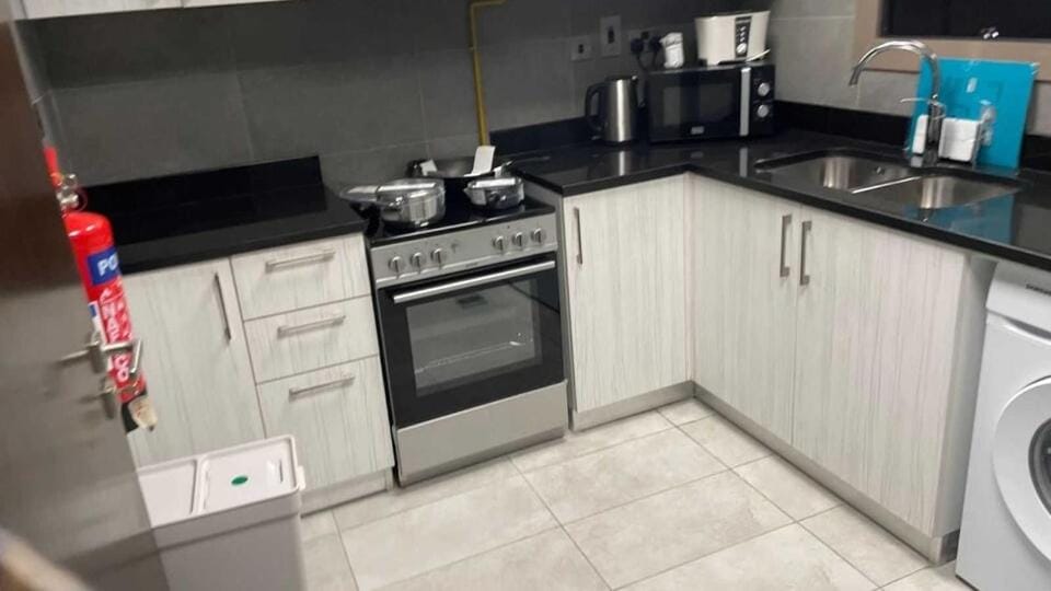 OYO HOME 1381 Premium 1 BHK With Balcony Hotel in Abu Dhabi