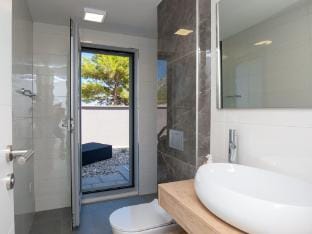 Apartments Dva Galeba - One Bedroom Apartment with Garden Terrace 202 Hotel in Bol