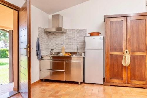 Village with swimming-pool and private equipped beach in Montalto Marina Hotel in Lazio