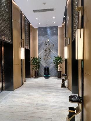 M Wisdom Apartment (Huzhou Aishan Square Xinye ICC Shop) Hotel in Suzhou