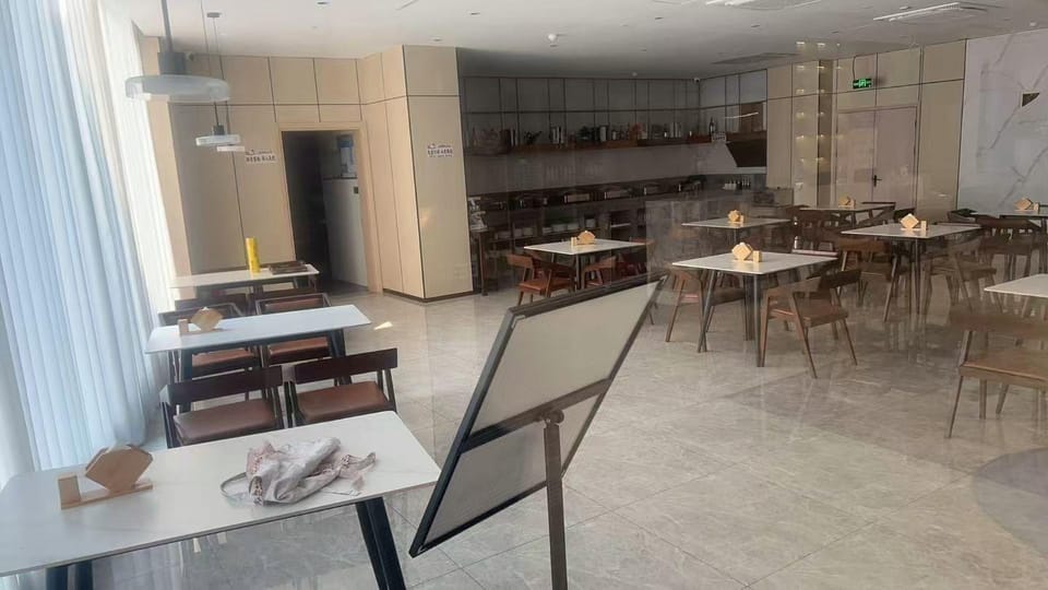 Muze Cinema Hotel (Shaoxing Paojiang Agricultural and Commercial College Branch) Hotel in Hangzhou