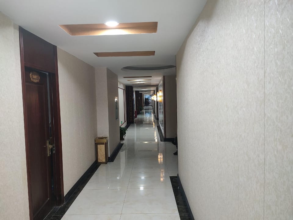 Jiuzhou Business Hotel (Yizheng Pedestrian Street Branch) Hotel in Nanjing