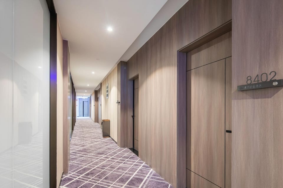 Qingmu Platinum Hotel (Nanjing Pukou Youth Olympic Sports Park Wende Road Metro Station Branch) Hotel in Nanjing