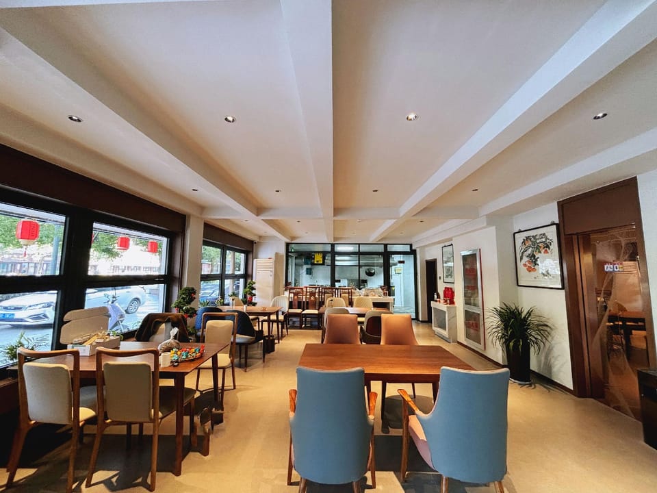 Nanxun Ancient Town Branch: A B&B with Calligraphy, Painting, and Aesthetics by the Xunxi River Hotel in Suzhou