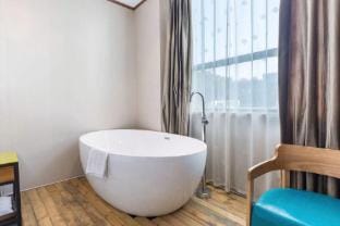 Meihao Haitang Hotel (Zhangjiagang Jiyang Lake Branch) Hotel in Suzhou