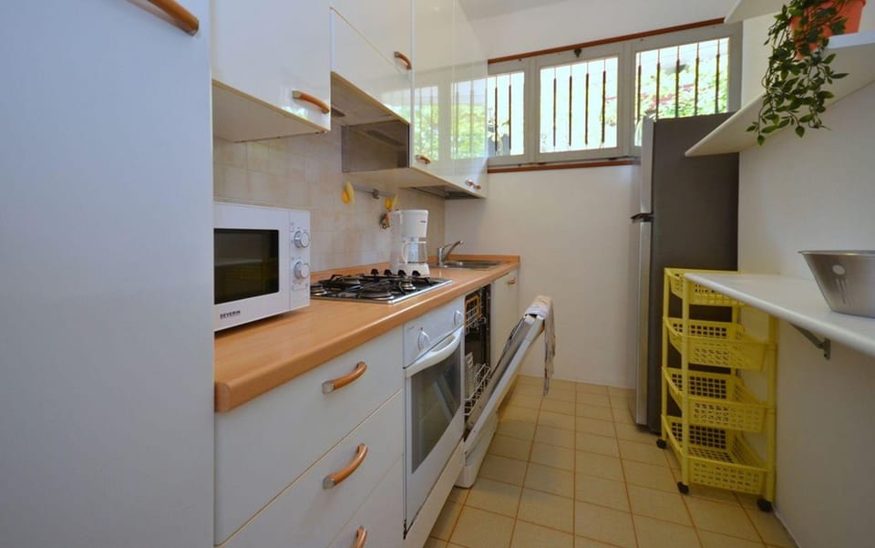 Spacious villa surrounded by lush greenery Resort in Lignano Sabbiadoro