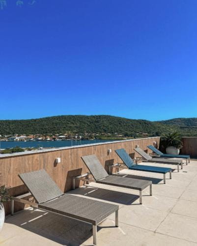 Flat moderno perto da Praia do Forte e Passagem Hotel in Cabo Frio