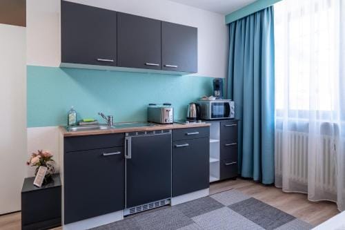 NEW Gastehaus Flora,Kitchen,TV,Free Parking,near Europa Park and Strasbourg Hotel in Offenburg