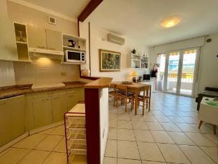 Bright apartment with pool Hotel in Porto Santa Margherita