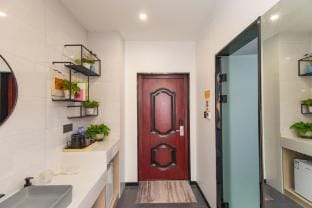 Yizhi Baihe Smart Shouxian Tianfu Plaza Apartment (Dongjin Avenue Branch) Hotel in Jiangsu