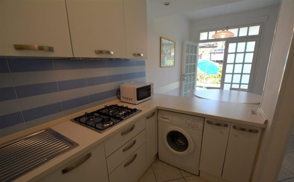 Semi detached villa with private fenced garden in Lignano Pineta Resort in Lignano Sabbiadoro