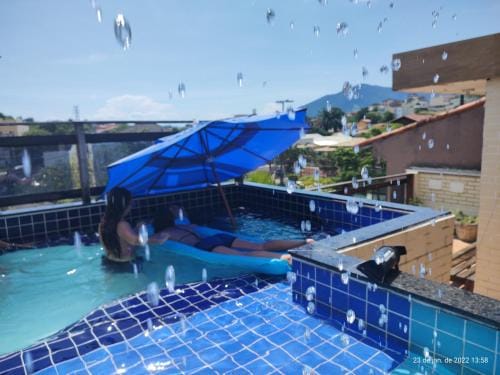 Casa Rustica com piscina,churrasqueira,banheira e ar condicionado Hotel in Rio de Janeiro