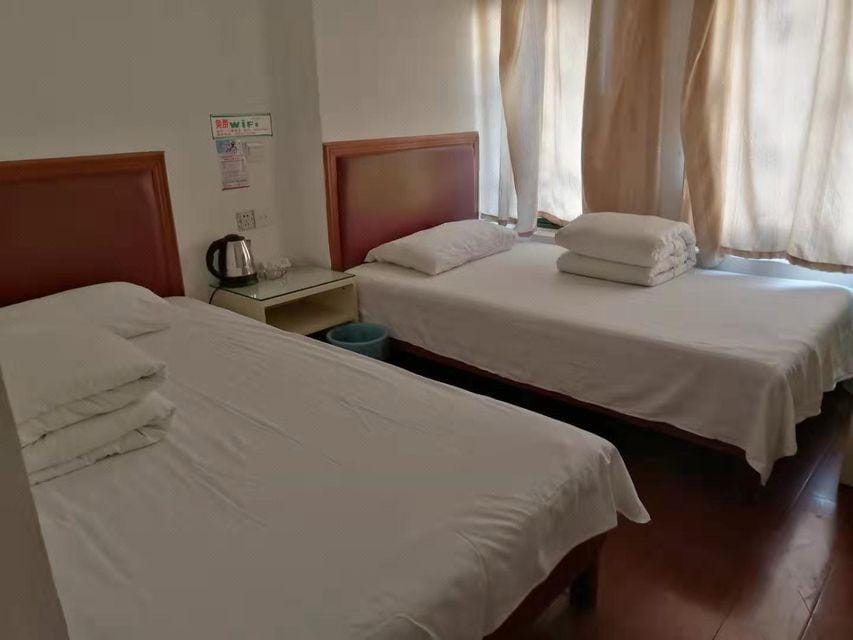 Wuxi Menlou Guest Room Hotel in Suzhou