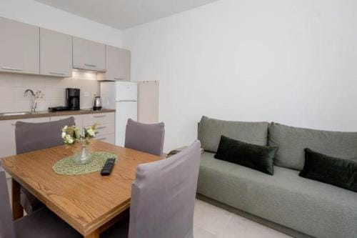 Apartments and rooms by the sea Palit, Rab - 24303 Hotel in Lika-Senj County