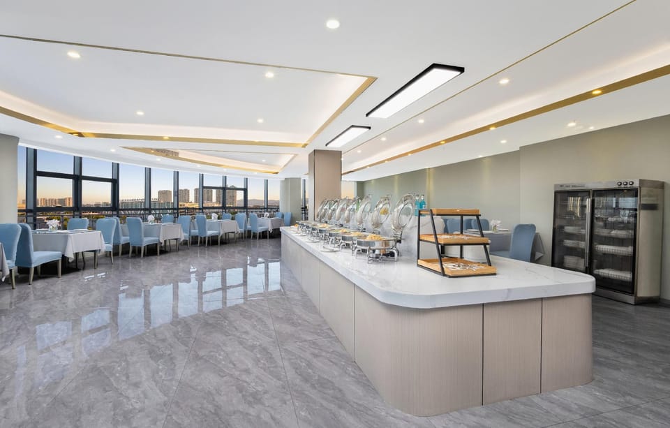 Zhihui Orange Hotel (Dongyang Woodcarving City Yintai City Branch) Hotel in Hangzhou