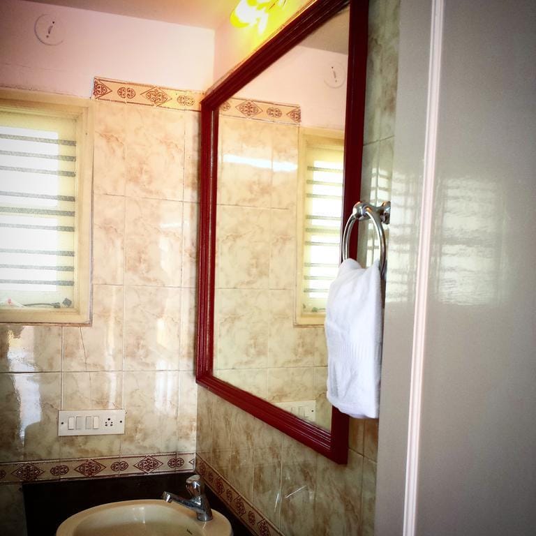 Varsha Enclave- White House Hotel in Mysuru