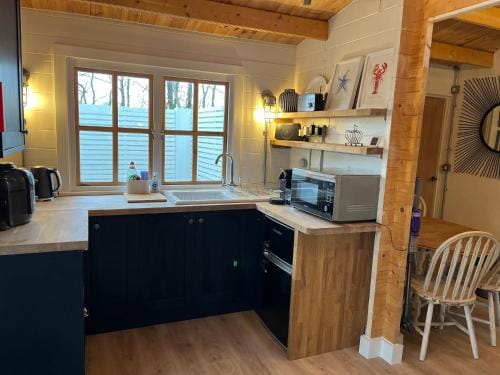 White River Retreats luxury lodges with Private Wood Fired Hot Tub Lodge in Wales