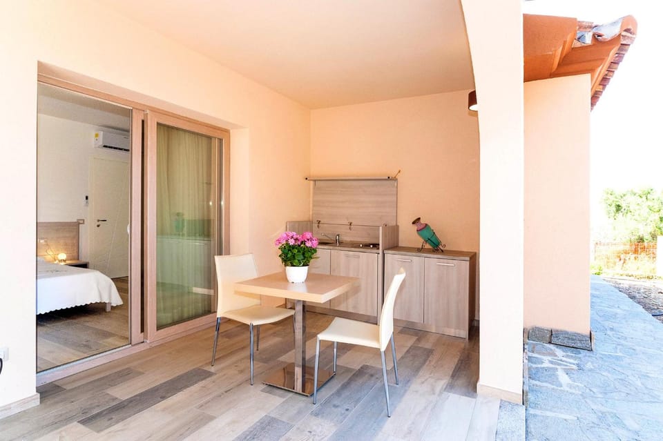 MOLAROTTO CAMERE CON ANGOLO COTTURA Apartment hotel in Sardinia