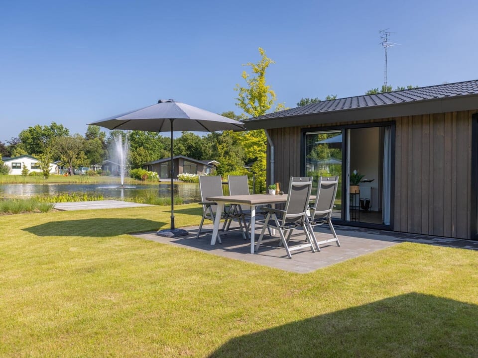 Modern Chalet on the Pond in a Holiday Park Hotel in Eindhoven