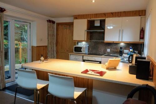 Waterfall Lodge - private waterfall and sauna Lodge in Scotland