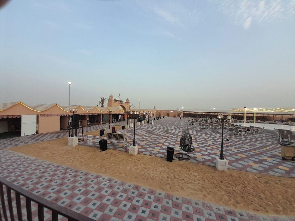 Sunset Desert Safari With Glamping Hotel in Dubai