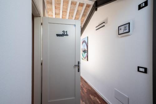 GuestHost - Santo 86 Luxury Rooms Hotel in Padua