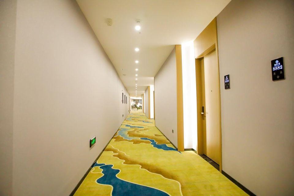 Quankai Business Hotel (Hefei Feidong Longtang East China Building Materials Center Store) Hotel in Jiangsu