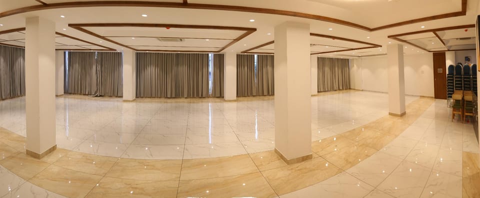 Roots luxury suits & Banquets Hotel in Bengaluru