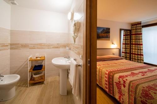 Chambres d'hotel a Rosy Hotel in Aosta