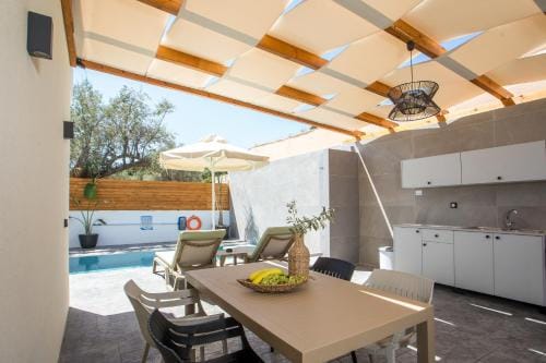 Aura Luxury Villas Hotel in Kolympia