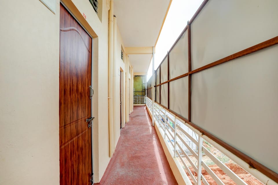 OYO New Dhan Win Lodge Hotel in Mysuru