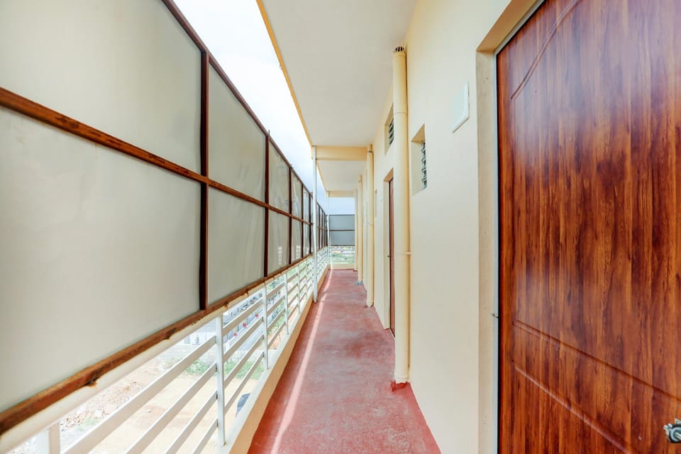 OYO New Dhan Win Lodge Hotel in Mysuru