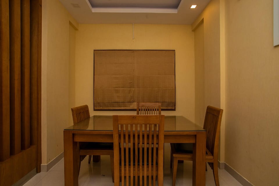 Capital O El Cielo Near Sri Amruth Chithra Mandira Hotel in Bengaluru