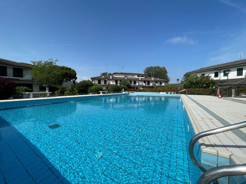 Lovely villa with a private garden Resort in Porto Santa Margherita