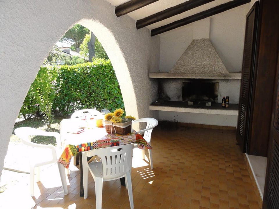 Peaceful villa with outdoor fireplace Resort in Bibione