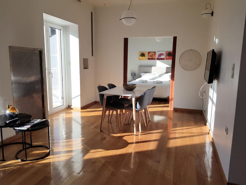Penthouse of light at Koukaki Hotel in Kallithea