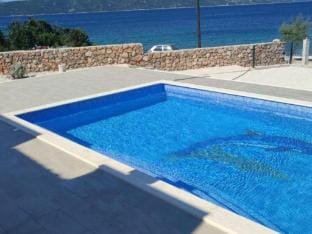 Villa Tamaris - Two Bedroom Holiday Home with Terrace and Swimming pool Hotel in Split-Dalmatia County