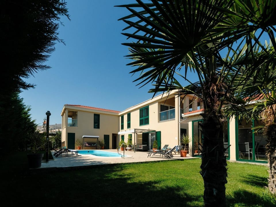 Luxury Villa with Heated Pool, Terrace, and Outdoor Amenities for Relaxation - Five Bedroom Villa Hotel in Trogir
