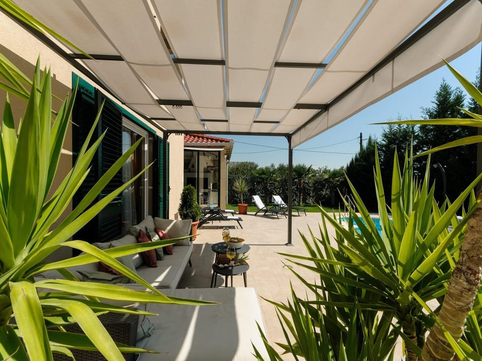 Luxury Villa with Heated Pool, Terrace, and Outdoor Amenities for Relaxation - Five Bedroom Villa Hotel in Trogir