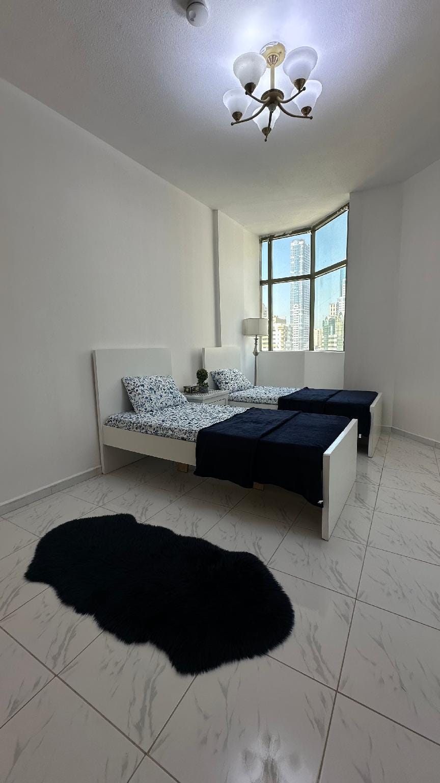 Single Bed in Super Deluxe Shared Youth Apartment Hostel in Al Sharjah