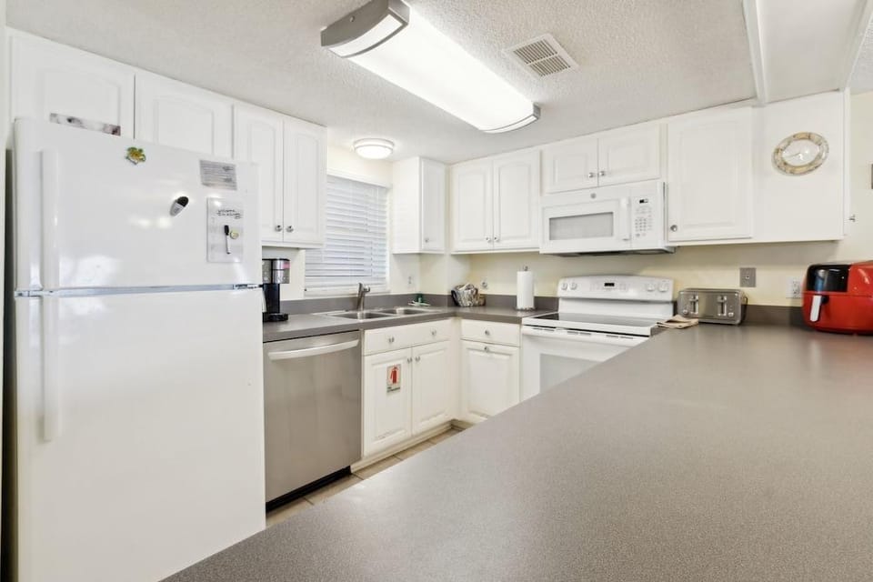 Oceanfront Beach Condo with Private Balcony, Short Walk to Pool and Beach by RedAwning Hotel in Fernandina Beach