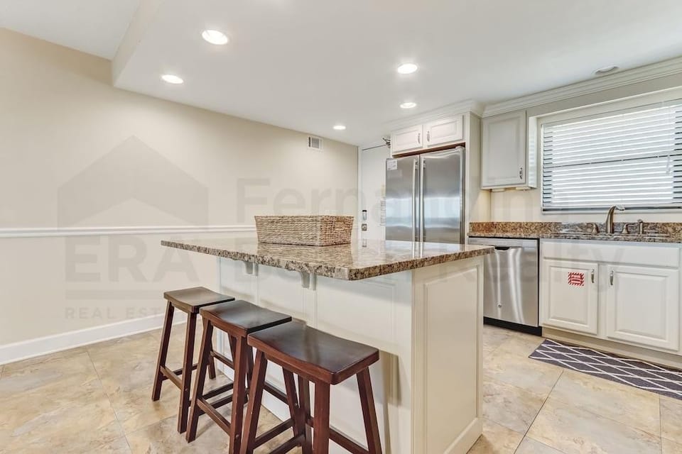 Upper unit Overlooking the Beautiful Outdoor Space and Pier by RedAwning Hotel in Fernandina Beach