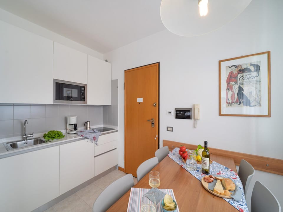 Spacious terrace in a green oasis Hotel in Bibione