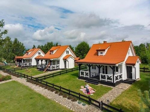 Domki nad jeziorem Widokowo Lodge in Lithuania