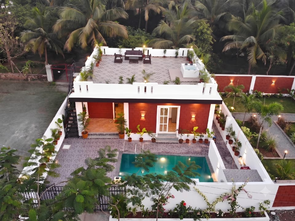 Coastal Palm Hotel in Alibag
