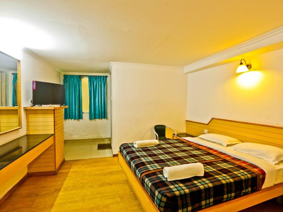 Snooze Inn Hotel in Kodaikanal