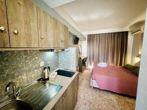 Peter's Place Studios & Suites Hotel in Faliraki, Greece