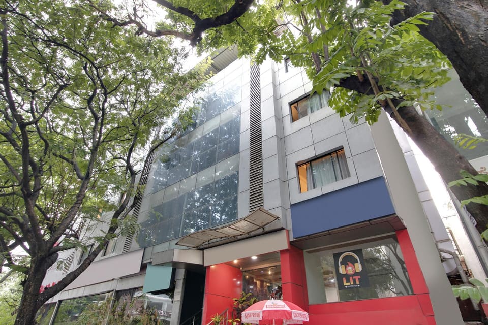 Capital O Elegant Amethyst Business Hotel Near Ragigudda Sri Prasanna Anjaneyaswamy Temple Hotel in Bengaluru