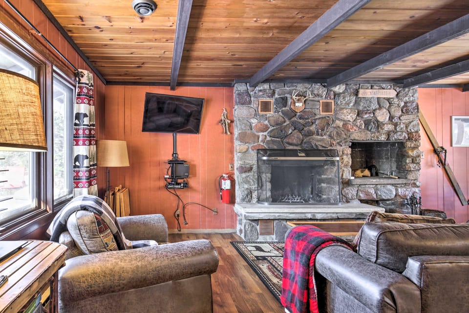 Deck + Fire Pit: Family Cabin in Bessemer House in Wisconsin