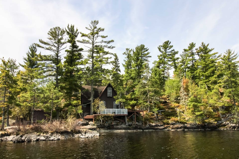Boat Dock & Beach: Charming Stop Island Cabin House in Minnesota